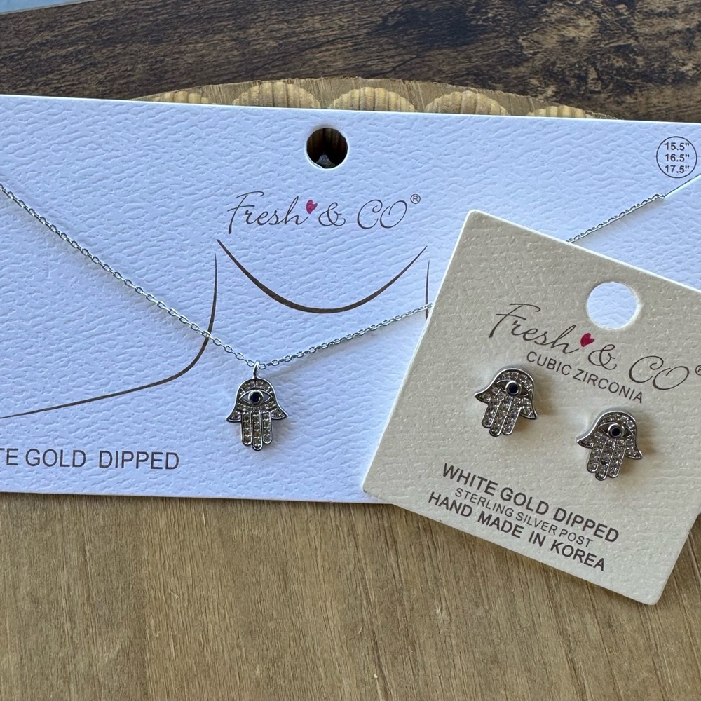 Silver Fresh & Co Hand Necklace and earrings